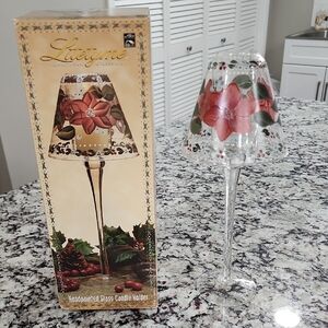 This is an Alco Litetyme Handpainted Glass Candle Holder with a holiday-theme.